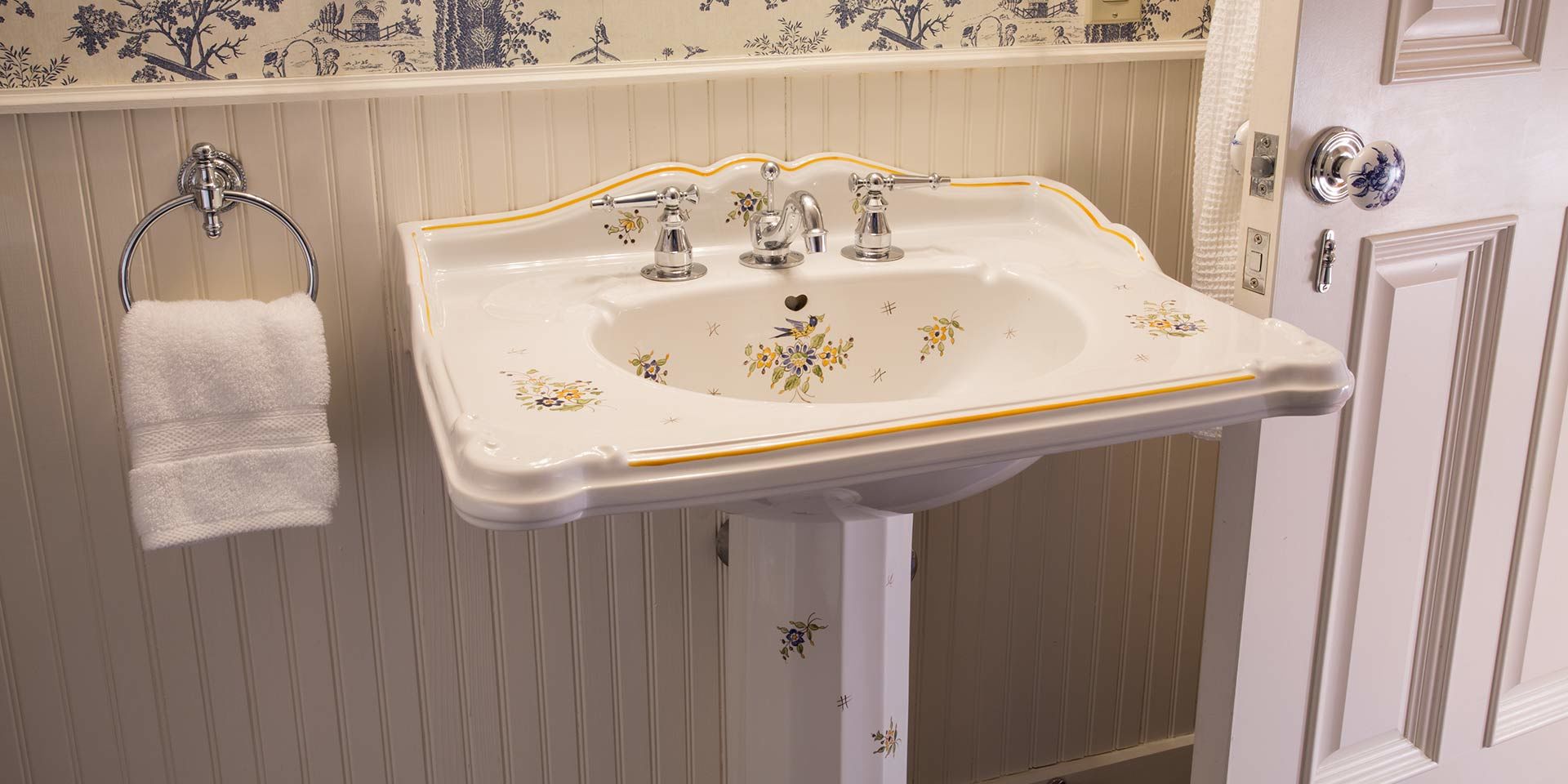 The sink inside the bathroom of the French Provincial Guest Room