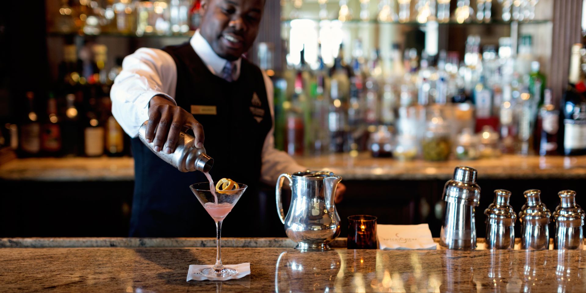 Maurice pouring a cocktail at The Chanler Bar