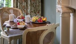 Enjoy a room service breakfast when you wake up inside the English Trellis Guest Room