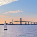 The Newport Claiborne Pell Bridge serves as the perfect backdrop for Newport Harbor.